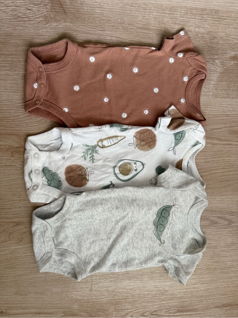 Bundle of Three Carter’s Newborn Onesies